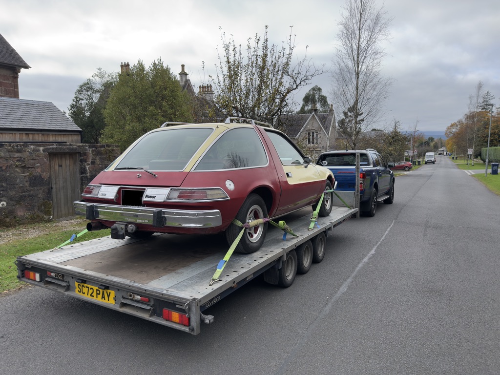 Classic two-tone car secured on the HS4 Transport trailer